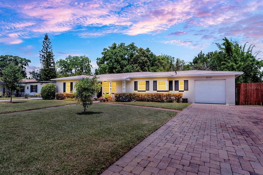 Front Exterior - Garage with paver driveway