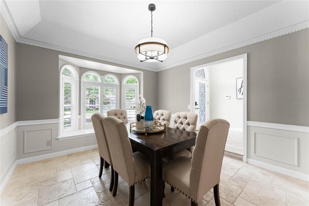 Dining Room featuring travetine stone flooring