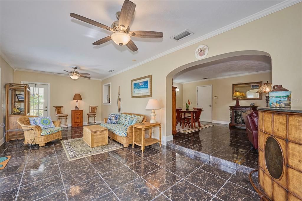 Florida room with view back into dining and living areas.