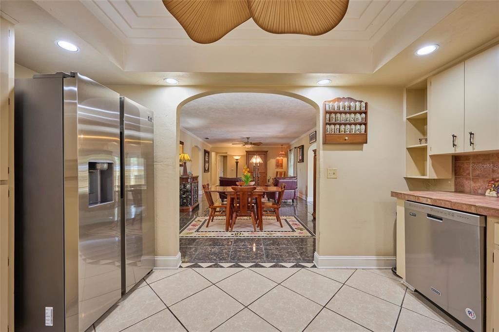 Looking back from kitchen to dining and family room