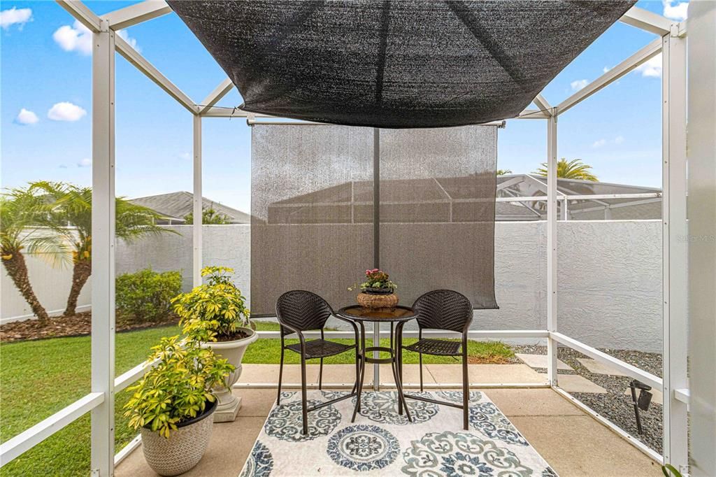 Step out into your screened lanai and courtyard