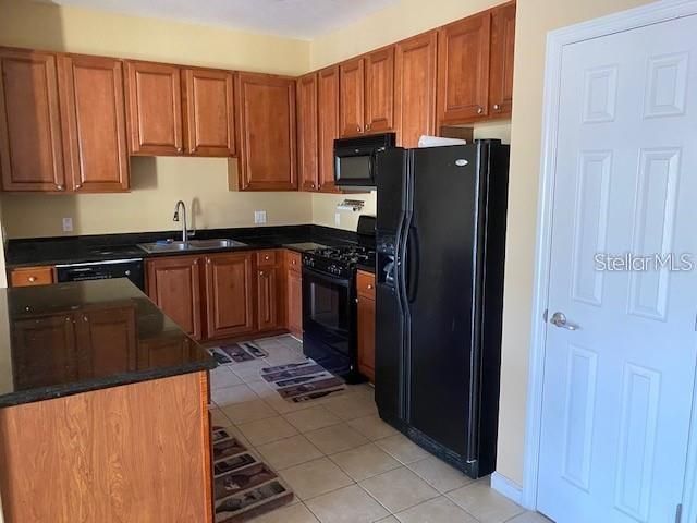 Kitchen with gas range and pantry