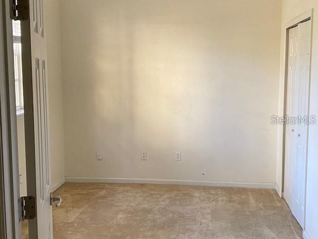 Downstairs bedroom/office with large closet