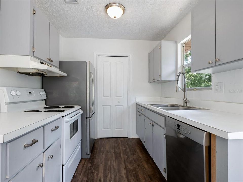 The galley kitchen has a walk-in pantry.  There is a hookup for a washer/dryer in the pantry.