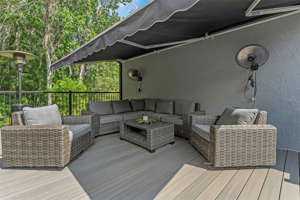 Patio with suspended swings to enjoy the mountain getaway feel overlooking the lush preserve that boarders this 3/4 acer parcel