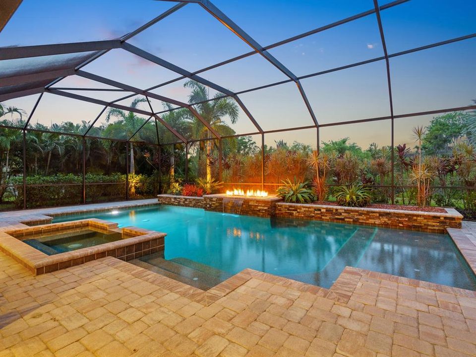 Private oasis with pool, spa, water feature, spacious screened lanai.