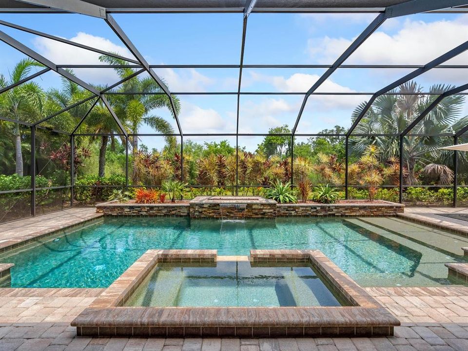 Pool & spa is surrounded by tropical foliage providing plenty of privacy.