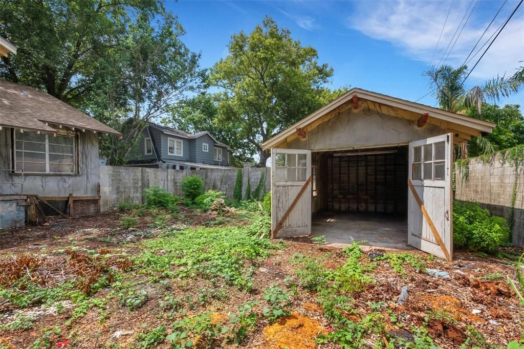 The ancient garage is still standing and would need work as well but possibilities for it's use abound.