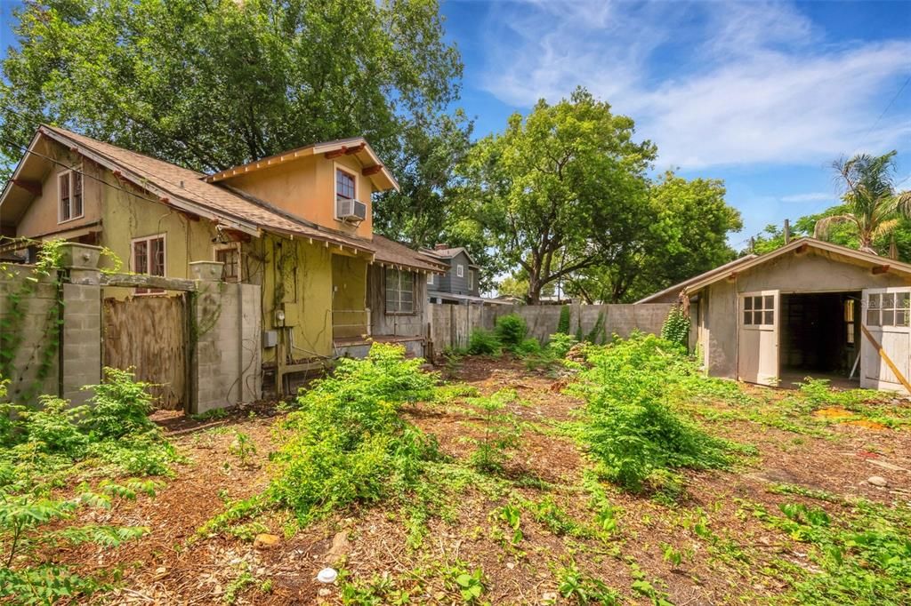 Large backyard is enclosed by 8' high block wall.