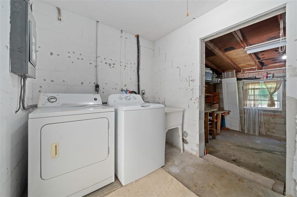 Laundry Room with Door to Carport & Workshop