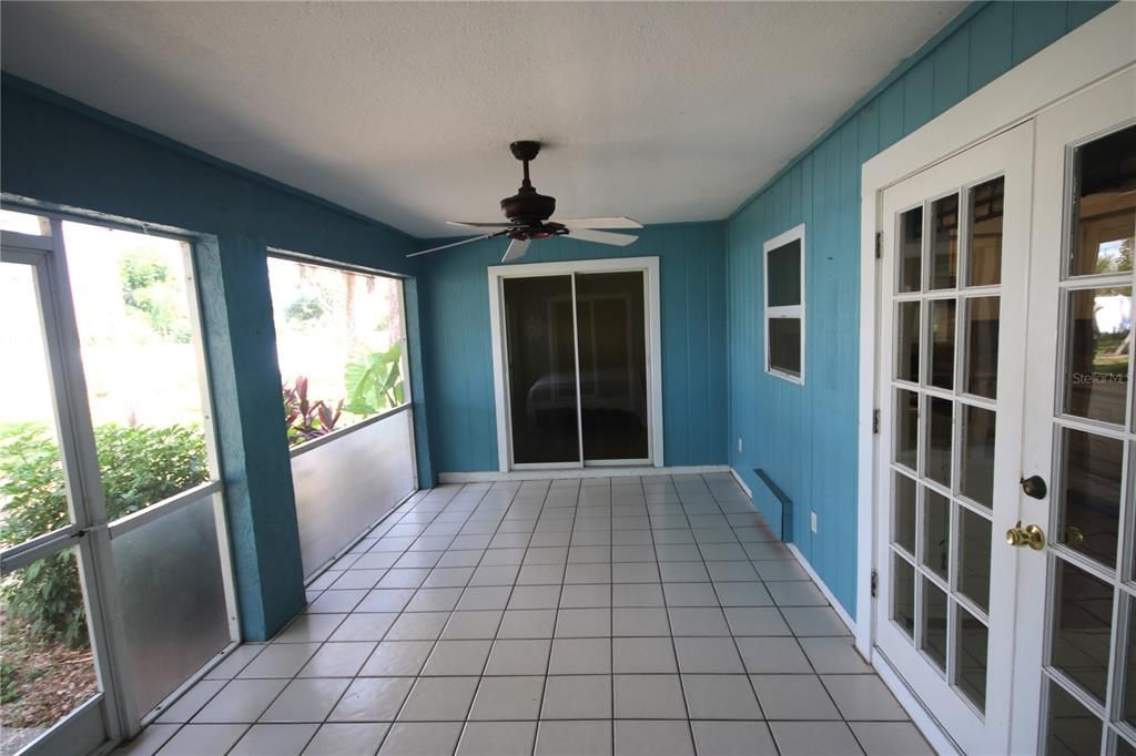 Large Florida room, sliders to 3rd bedroom, frence doors to kitchen/diining area