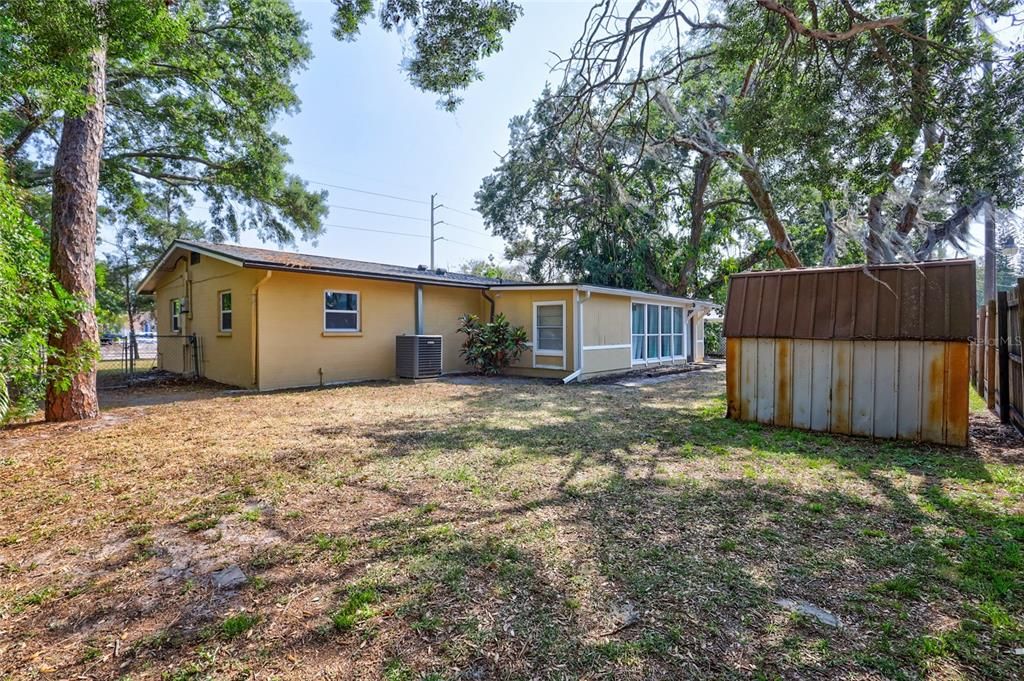 Fenced Backyard with Storage