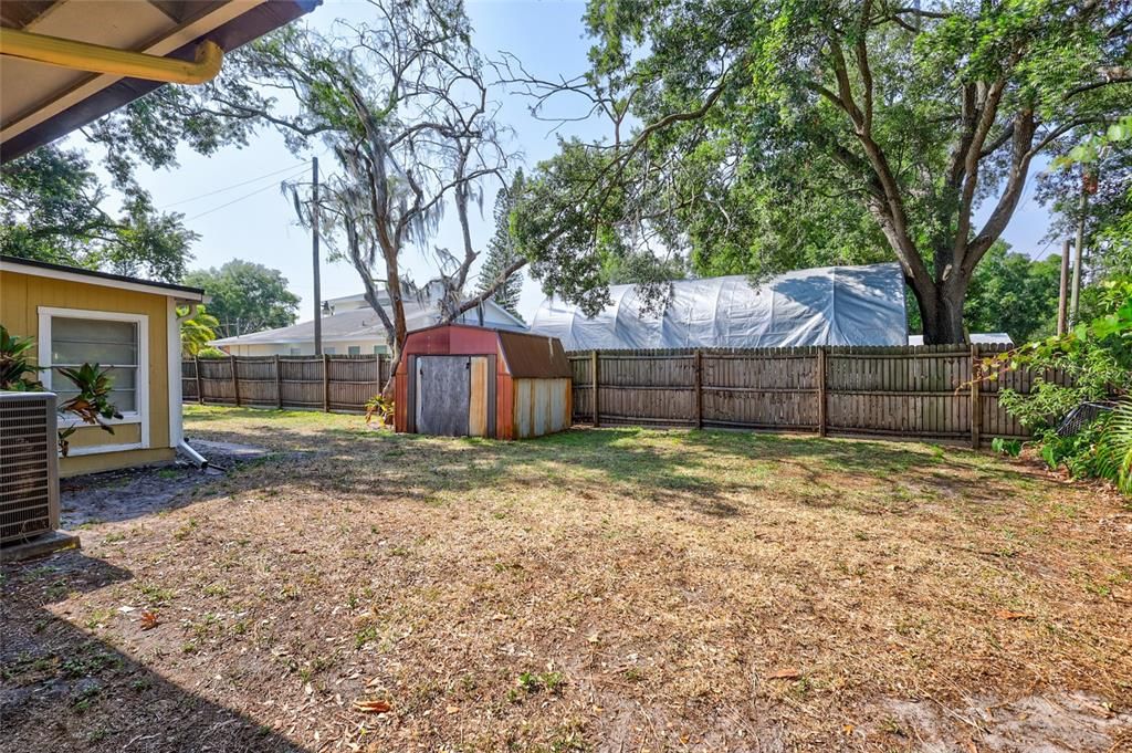 Fenced Backyard with Storage