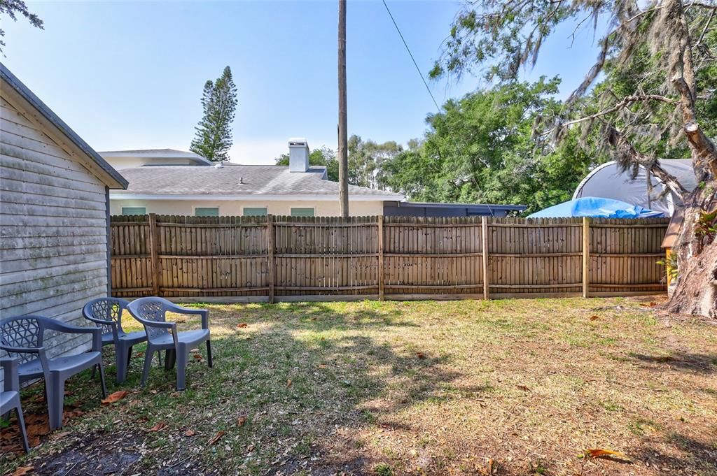 Fenced Backyard with Storage