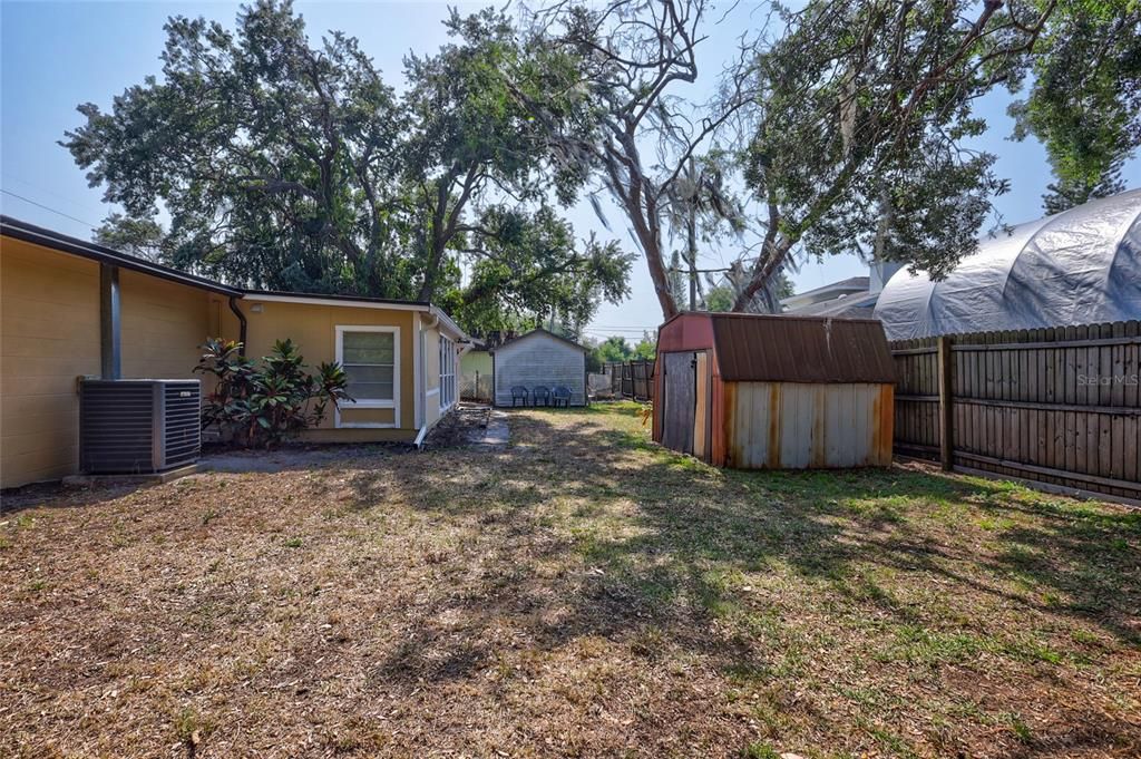 Fenced Backyard with Storage