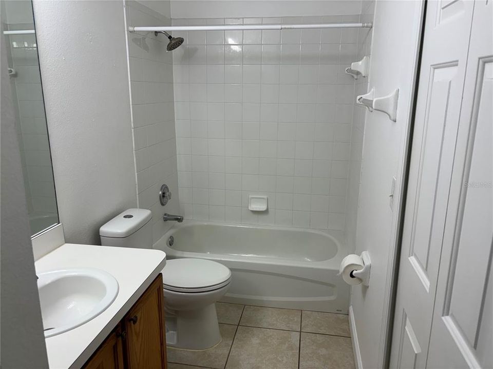 Guest bathroom with tub