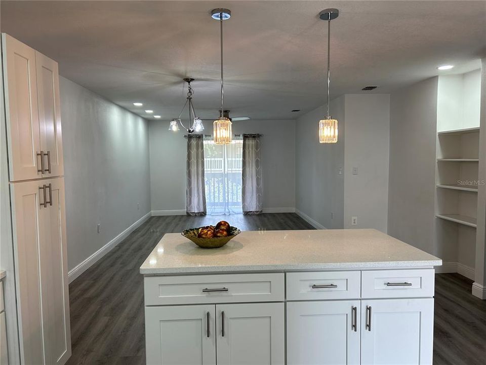 Enter to new open kitchen with beautiful island/breakfast bar.