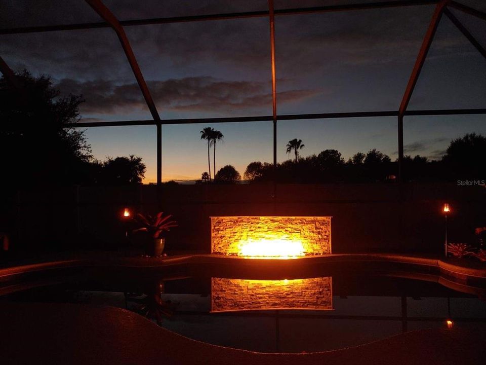 Unique fire feature showcases the beautiful pool.