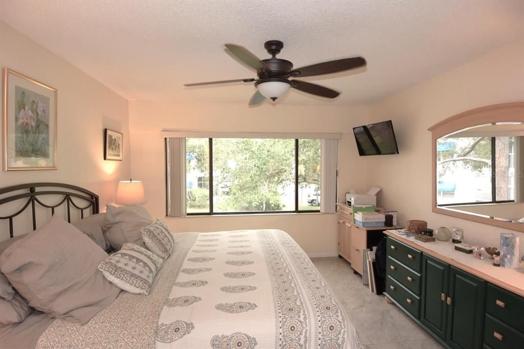 Primary Bedroom with Updated Ceramic Tile Flooring