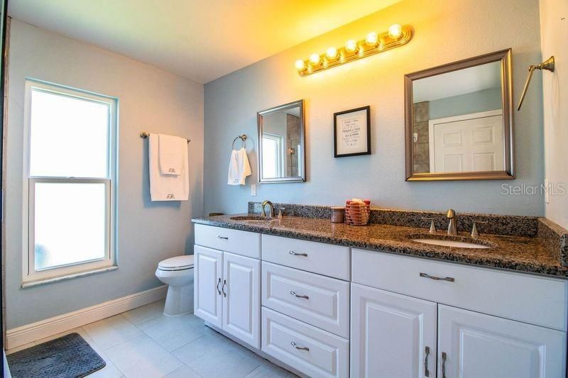 Day light is always a plus in your recently updated master bathroom!