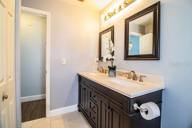 This bathroom can act as an on suite for your guests or a pool bath.