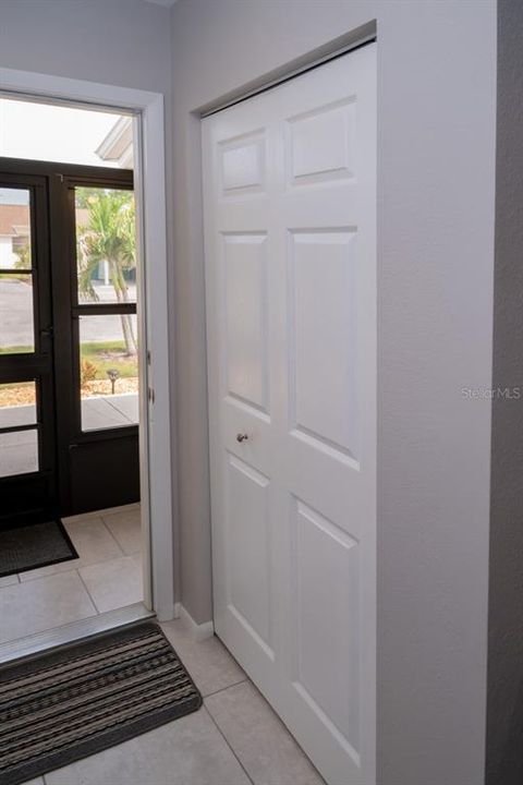 The newly screen-in front entance (summer 0f 2022) allows for good air flow, and the front entrance features a nice sized closet.