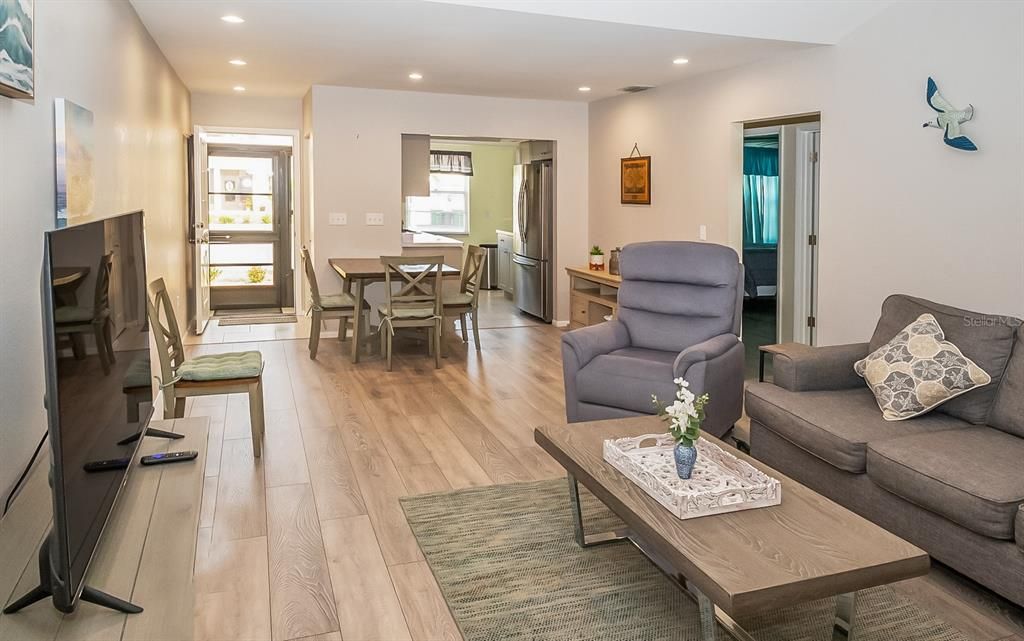 Living room is comfortable and practical, and features a sleeper sofa and a lift chair recliner.  Furniture was purchase in 2020 and 2022, and conveys with the sale.