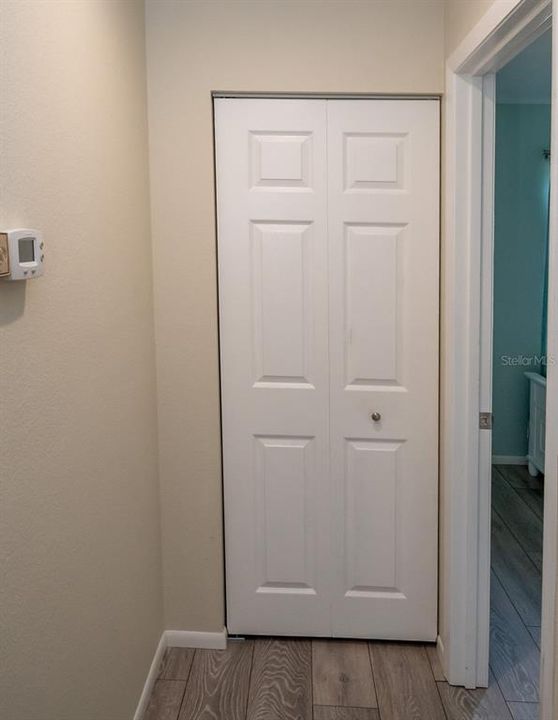 A nice-sized linen closet located outside the quest bedroom, provides plenty of storage.