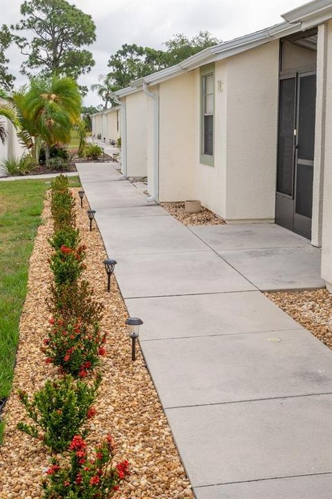 The community is beautifully landscaped, with sidewalks throughout.