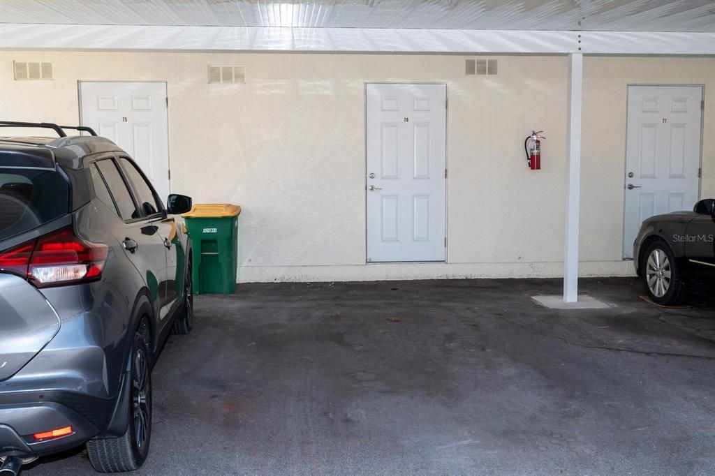 You have your very own covered carport and locked storage unit.