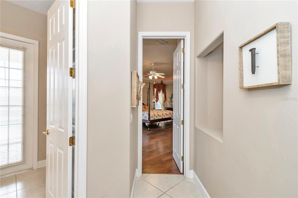 View of hall to pool bath and Primary Bedroom