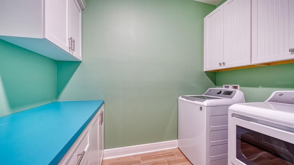 Laundry room behind kitchen