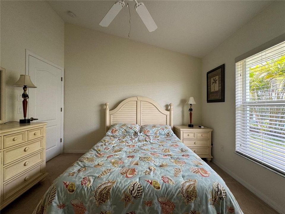 Third Bedroom: This room hosts a queen bed, catering to guests or family members with stylish decor and comfortable bedding, ensuring a restful sleep.