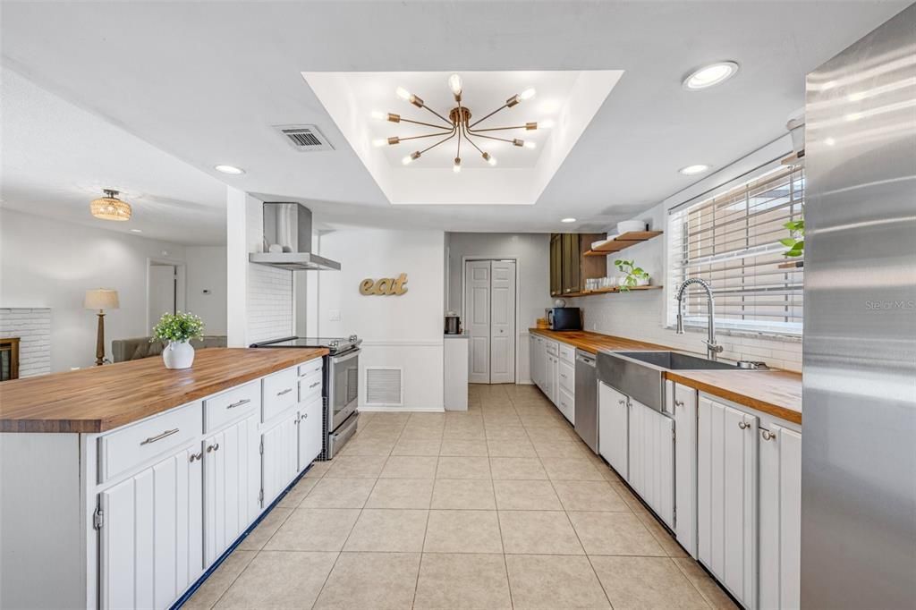 The kitchen also features an oversized walk-in pantry.