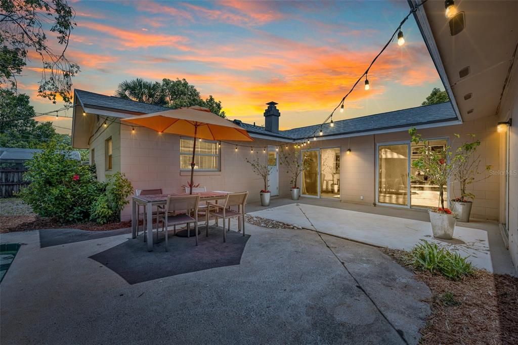 The spacious back patio is ideal for entertaining.