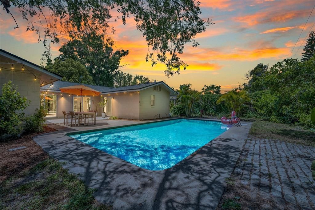 Enjoy a Florida lifestyle with this pool and expansive backyard.