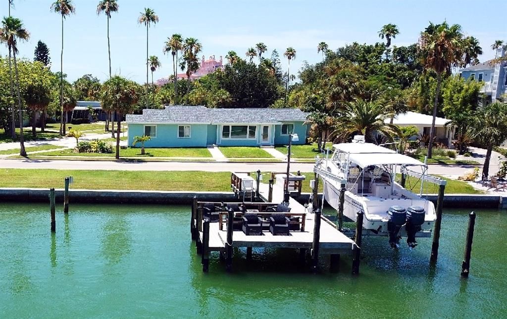 Front of home Featuring Multi-Level Dock and Optional Boat Lift
