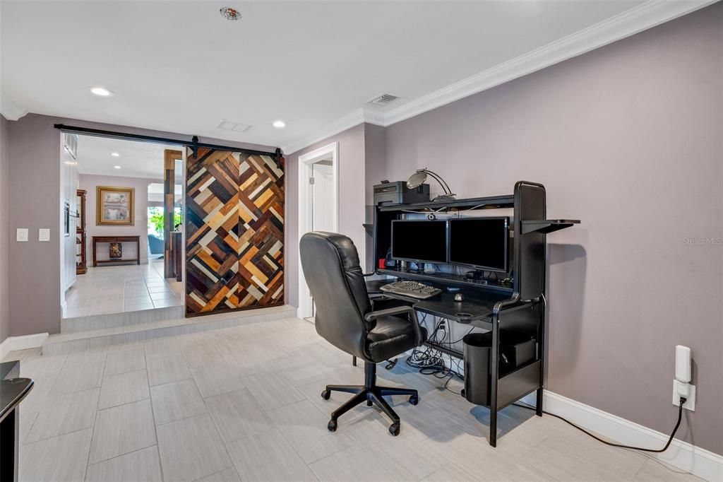 Home Office / Flex Space looking out onto Back Screened in Lanai