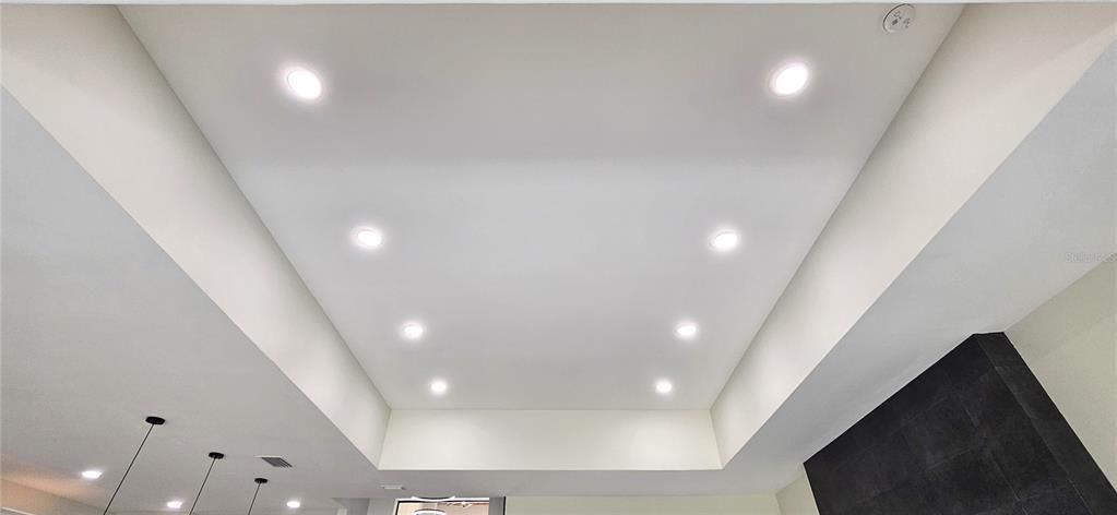 Trey ceiling includes 8 can lighting fixtures