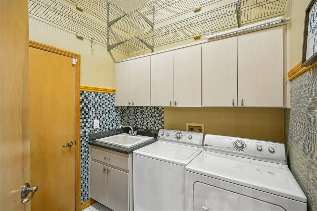 Laundry room with access to garage off kitchen