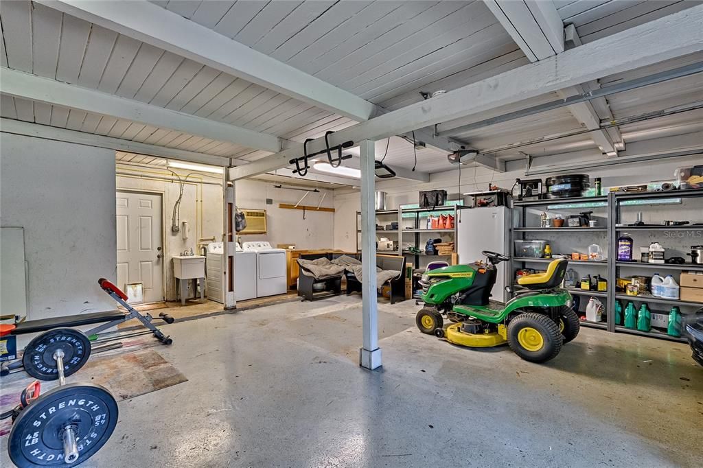 Large one car garage/utility area/entrance to house