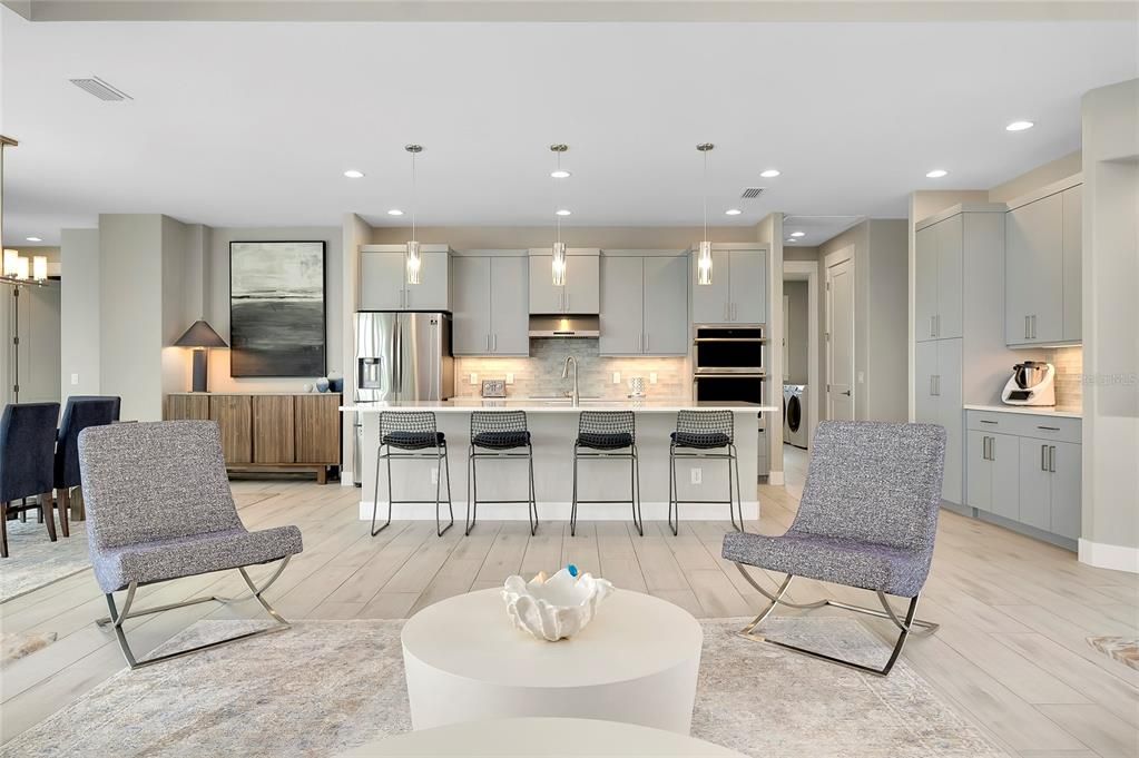 Kitchen with island and built in applicances