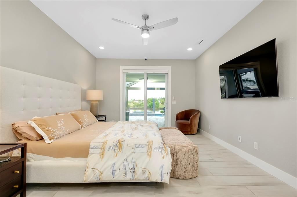 Primary bedroom with access to lanai / pool