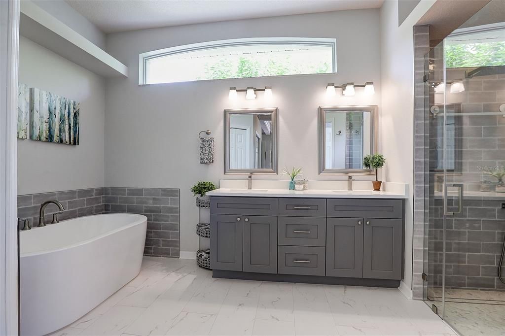 Check out the stunning primary bathroom just recently fully remodeled!