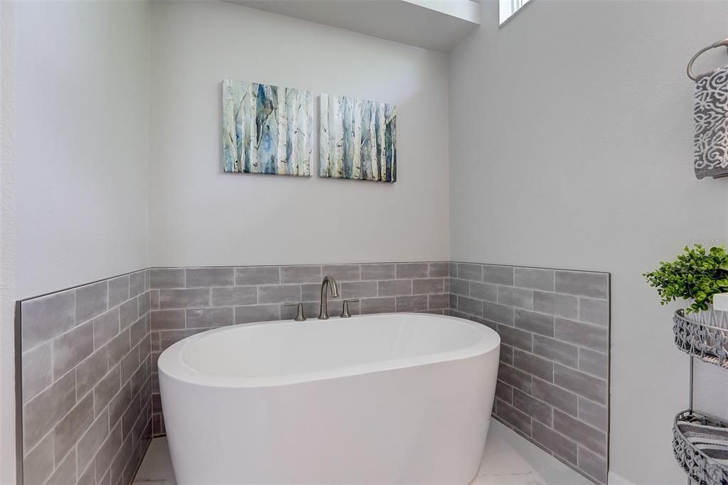 Check out the stunning primary bathroom just recently fully remodeled!