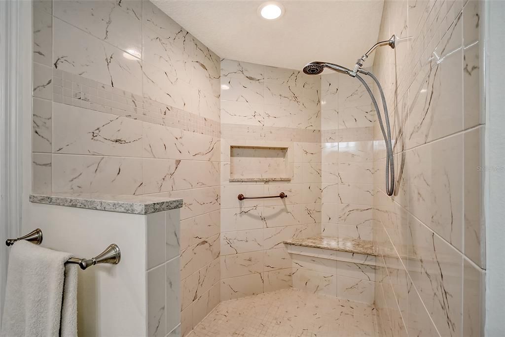 Primary Oversized Walk-in Shower with Built in Seat