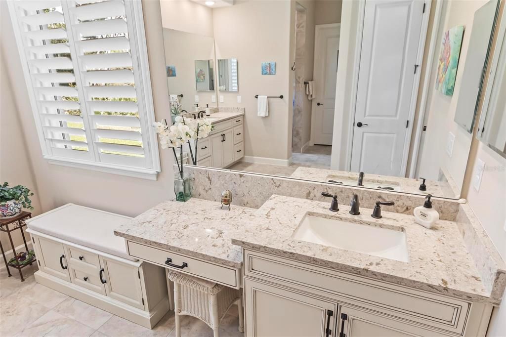 Here is a closer view of one sink side. The countertops are all quartz.