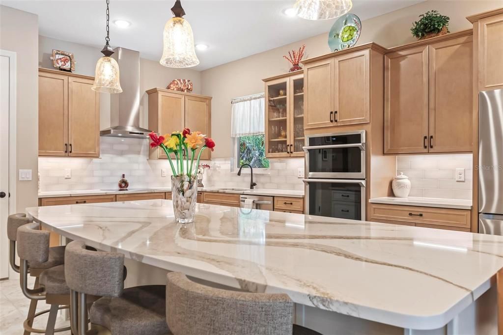 Quartz countertops in kitchen and all bathrooms.