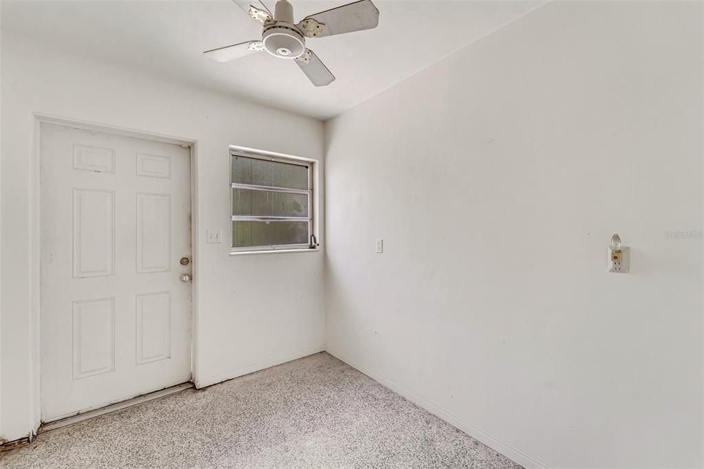 Side entrance door and mudroom.