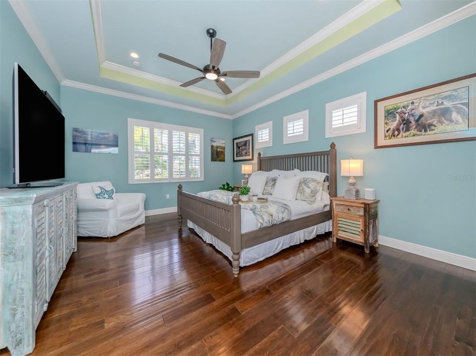 Primary Bedroom with beautiful wood floors